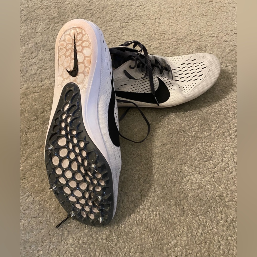 Men’s Nike track shoes.